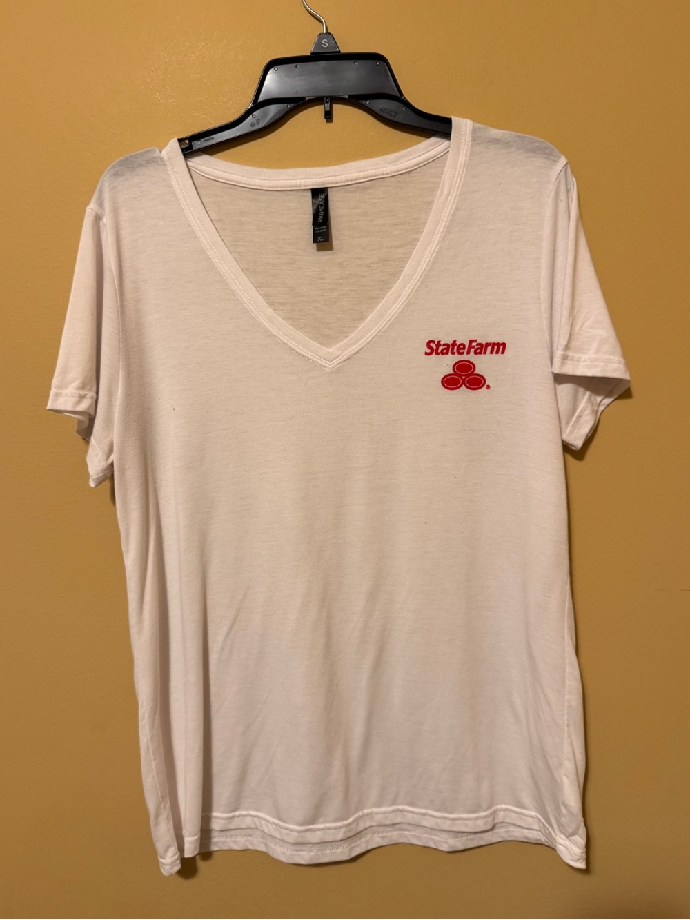 Primease Women’s State Farm White V-Neck Tee with Red Logo